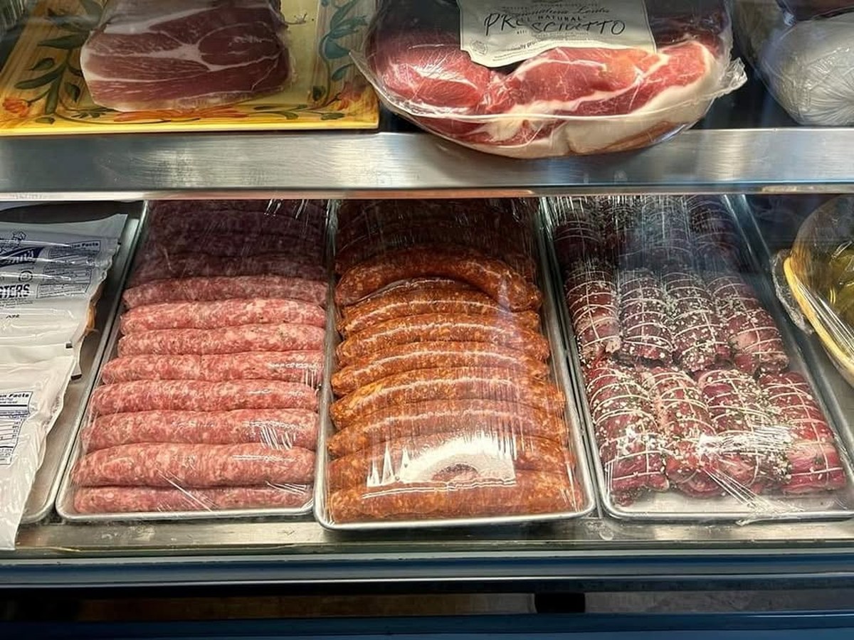 Fresh house-made Italian sausage links at Antonio's counter