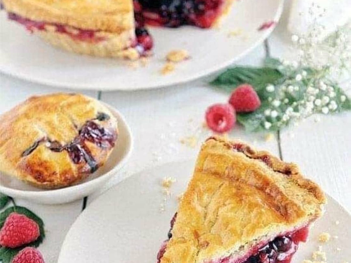 A deep-dish Upper Crust apple pie with a flaky golden crust