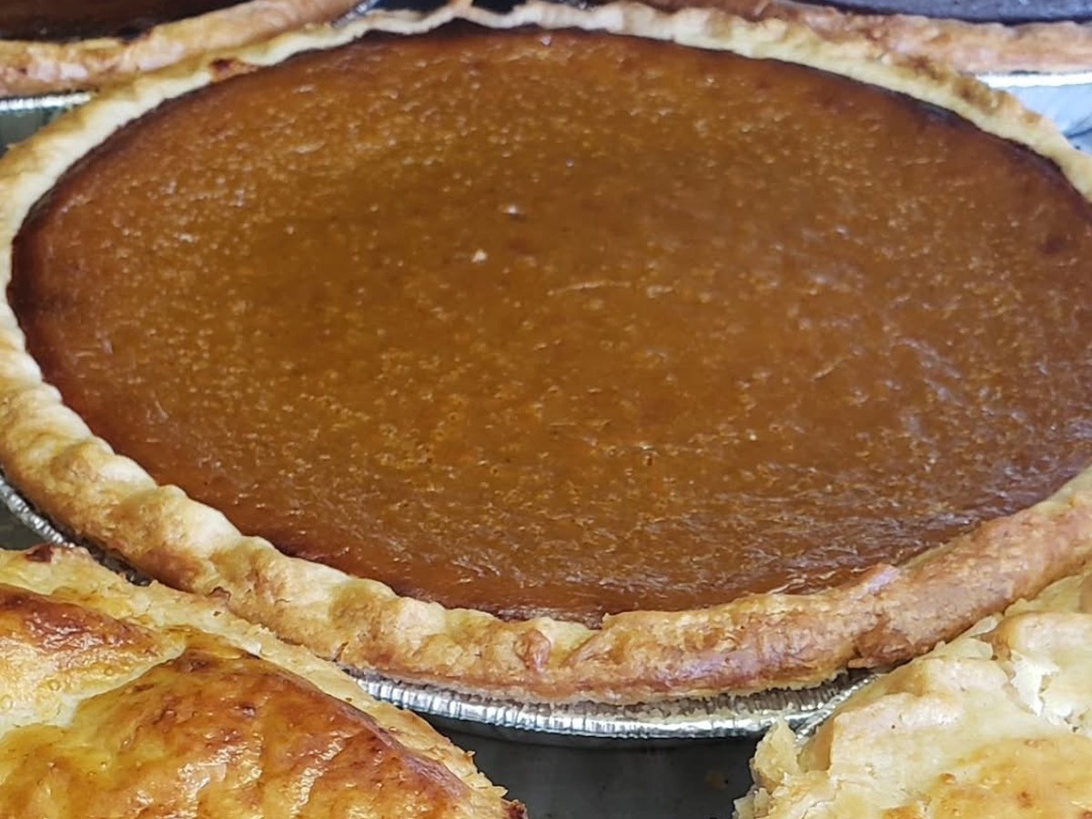 A deep-dish Upper Crust pie with a golden flaky crust